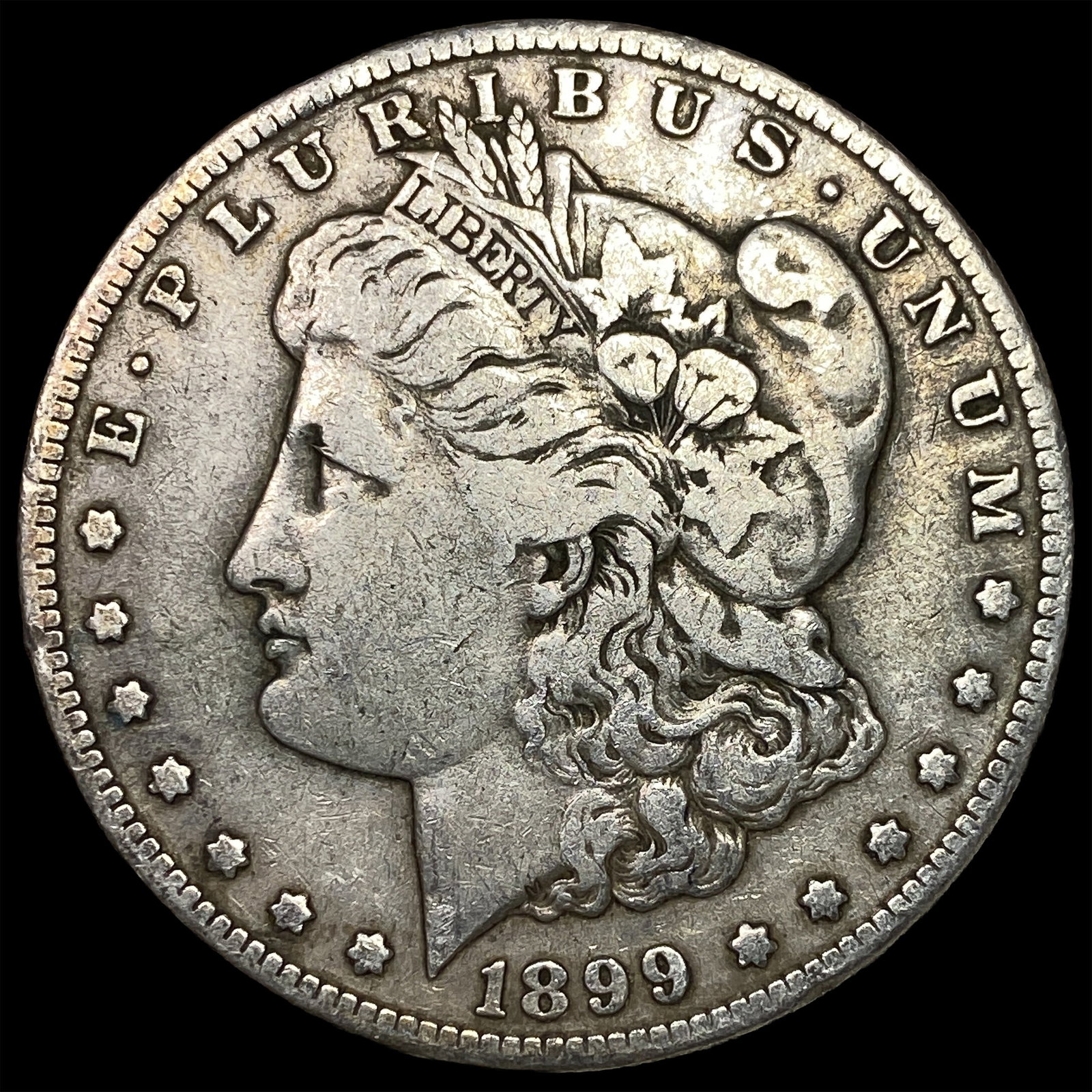 1899-S Silver Morgan Dollar ABOUT UNCIRCULATED: 1899-S Silver Morgan Dollar ABOUT UNCIRCULATED