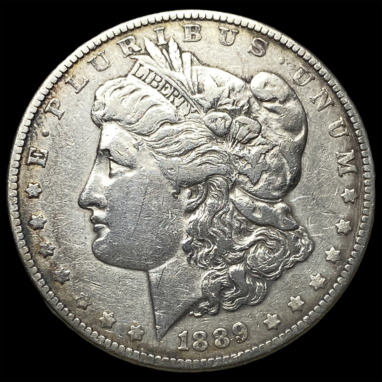 1889 Morgan Silver Dollar CLOSELY UNCIRCULATED (1 of 2)