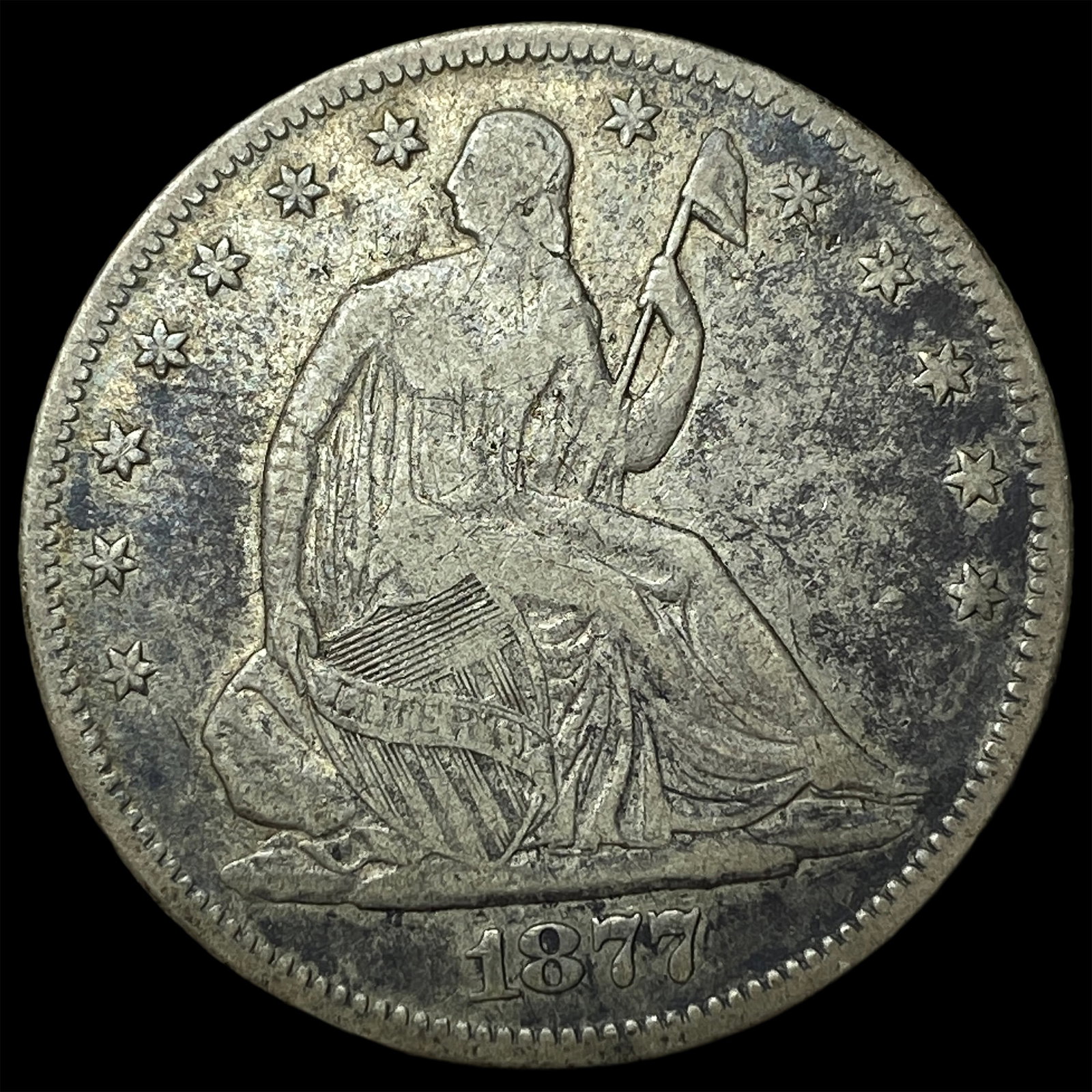 1877-S Silver Seated Liberty Half Dollar NEARLY UNCIRCULATED: 1877-S Silver Seated Liberty Half Dollar NEARLY UNCIRCULATED