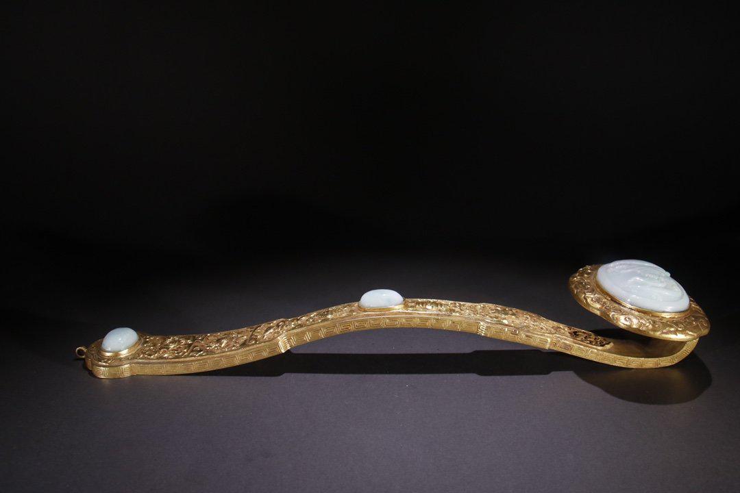 Gilt Bronze Ruyi Embeded with Jadeite: Height: 4.8cm; Width: 7.7cm; Length: 31.1cm; Weight: 619g