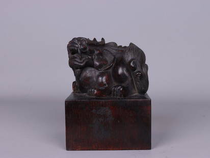 An Agarwood Seal: Height: 13.88cm; Width: 10.66cm; Weight: 357g