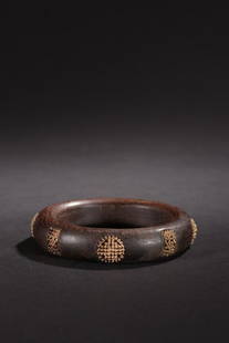 An Agarwood Bangle: Inner-Diameter: 5.8cm; Thickness: 1.5cm; Weight: 33g