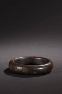 An Agarwood Bangle: Diameter: 8.4cm; Weight: 38g