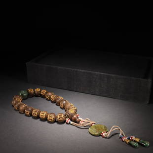 An Agarwood Bracelet: Bead-Diameter: 1.6cm; Weight: 90g