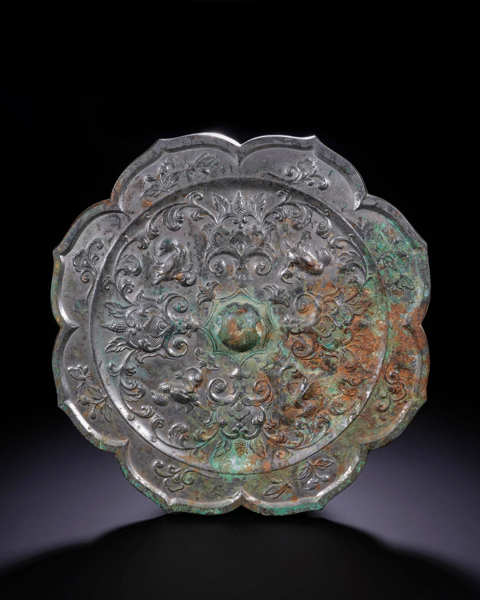 Tang copper rhombic flower-and-bird mirror: D:22.5cm