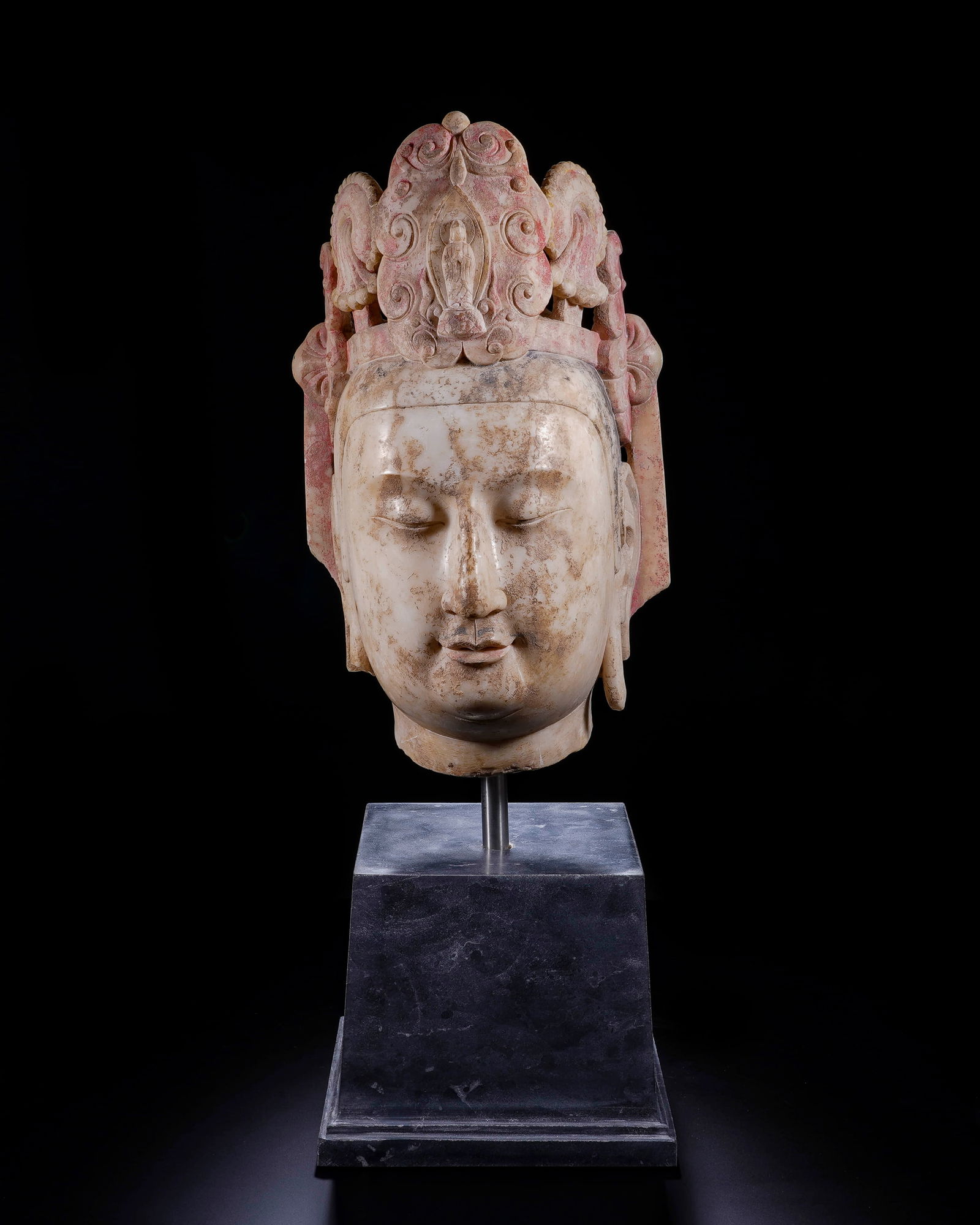 The head of the white marble huaguan Buddha in the Northern Qi Dynasty: L:21cm H:36cm