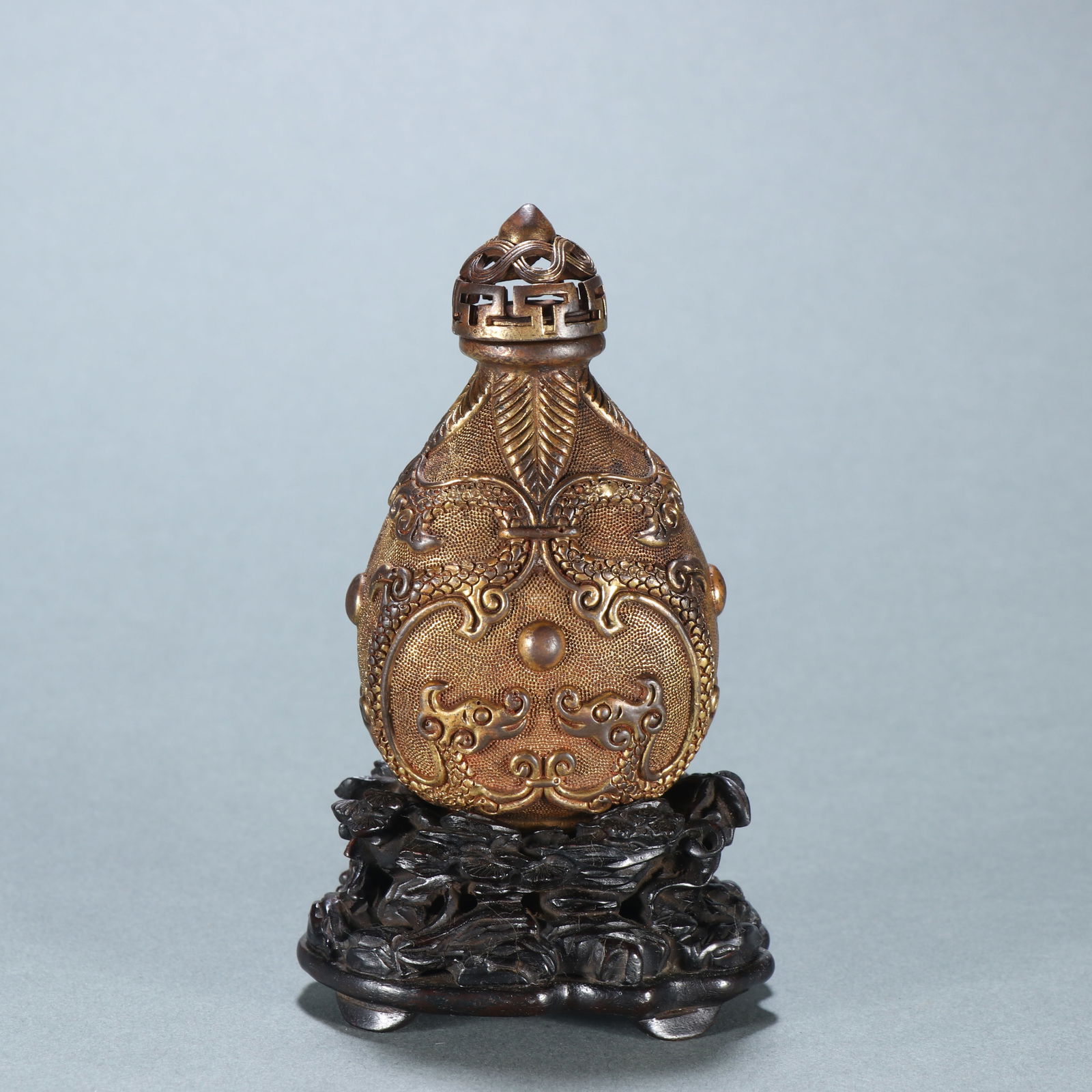 Qianlong style copper gilded snuff bottle (1 of 3)