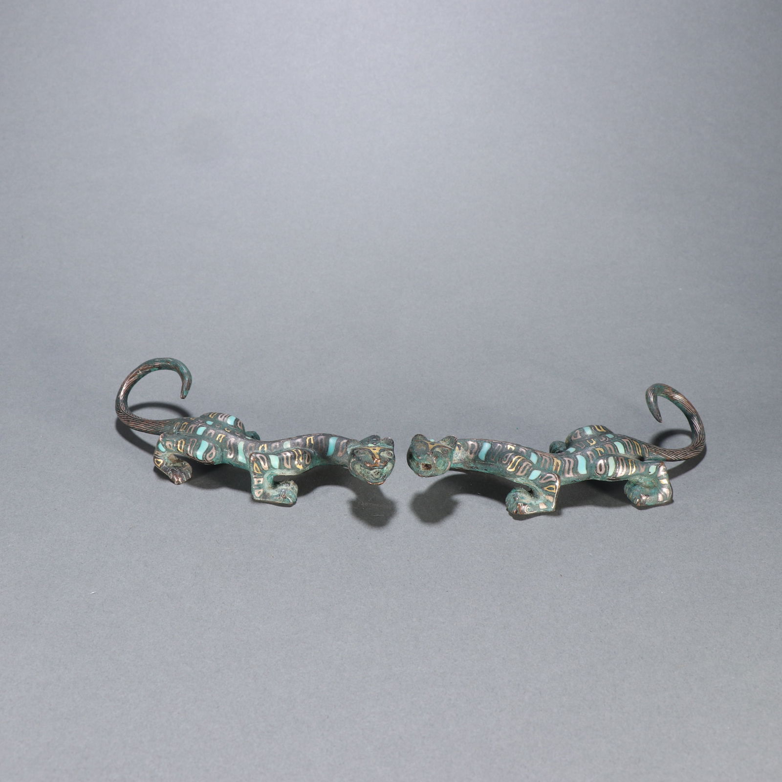 A pair of Han Dynasty bronze, gold and silver inlaid turquoise ornaments (1 of 3)