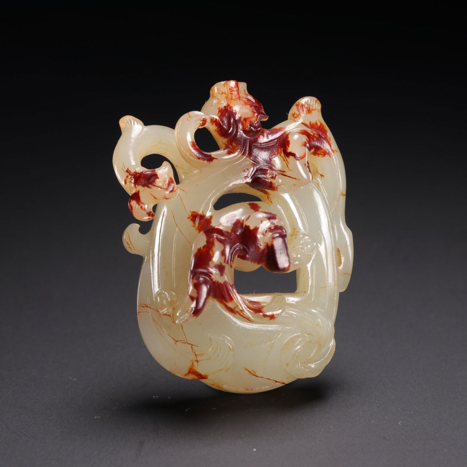 A jade chicken-heart pendant from the Han Dynasty (1 of 2)
