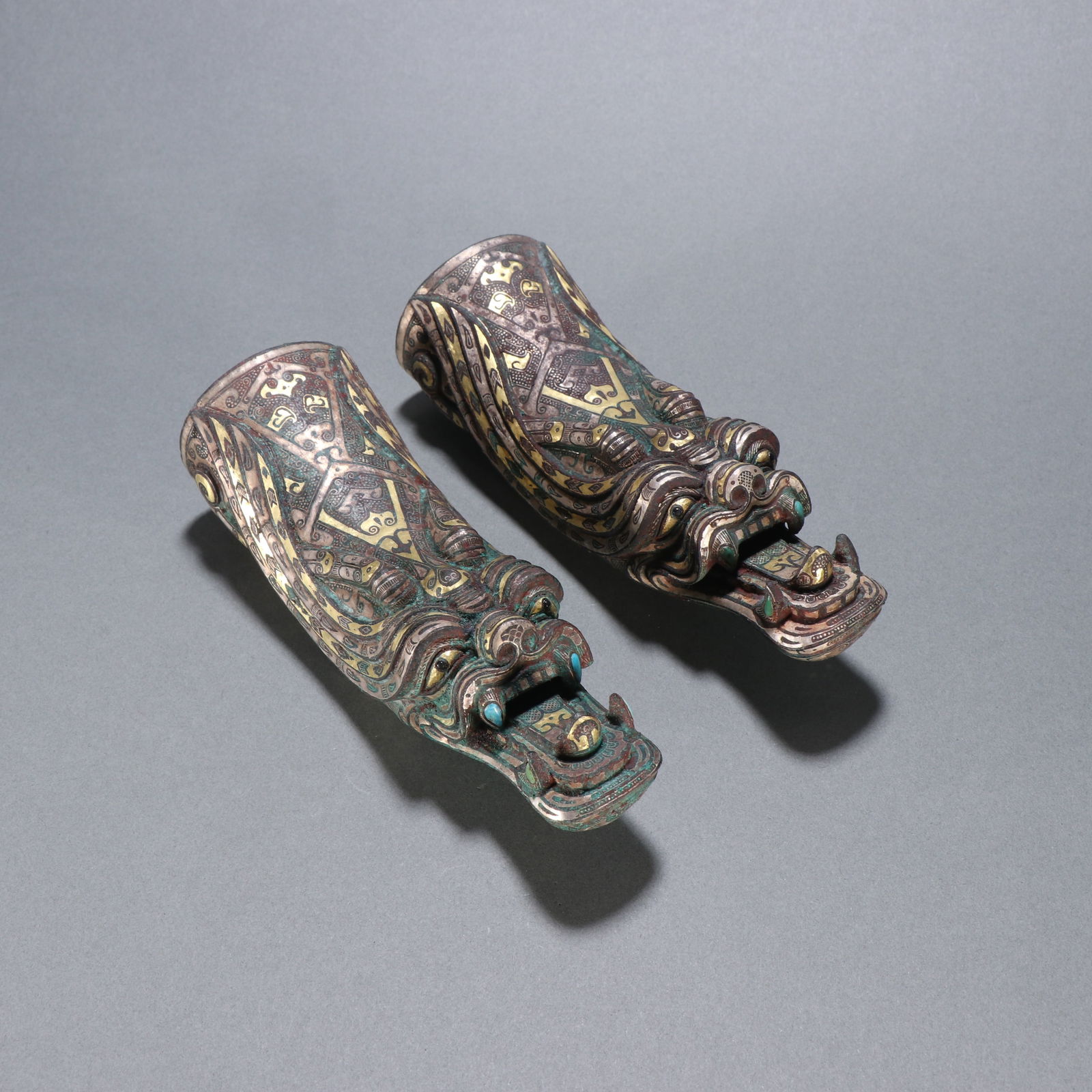 A pair of Han Dynasty bronze chariot and horse ornaments inlaid with gold and silver: 16*5/460g each