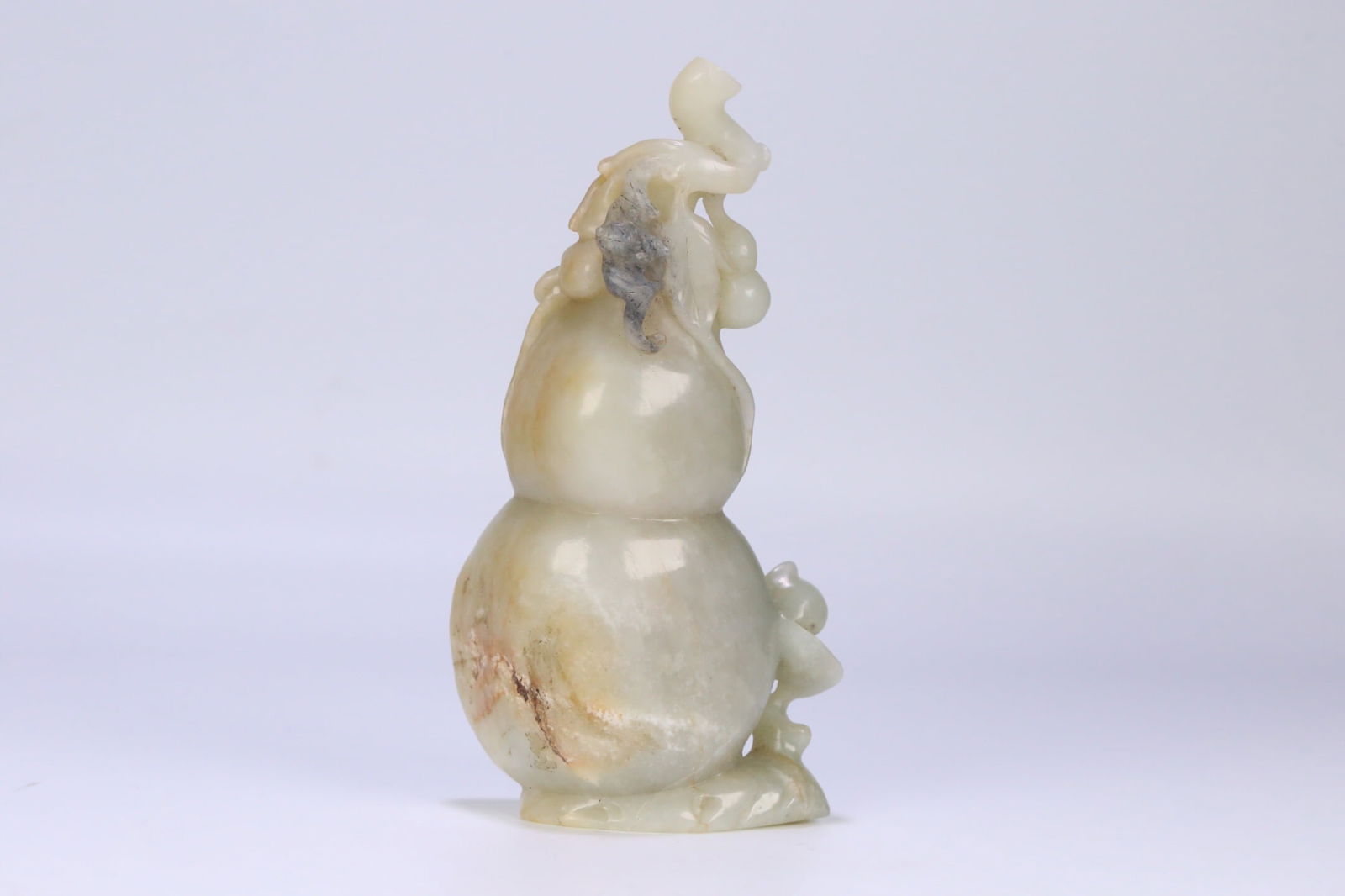 A Qing Dynasty Hetian jade blue and white seed material ornament: 19.2*10*5.6/883.3g