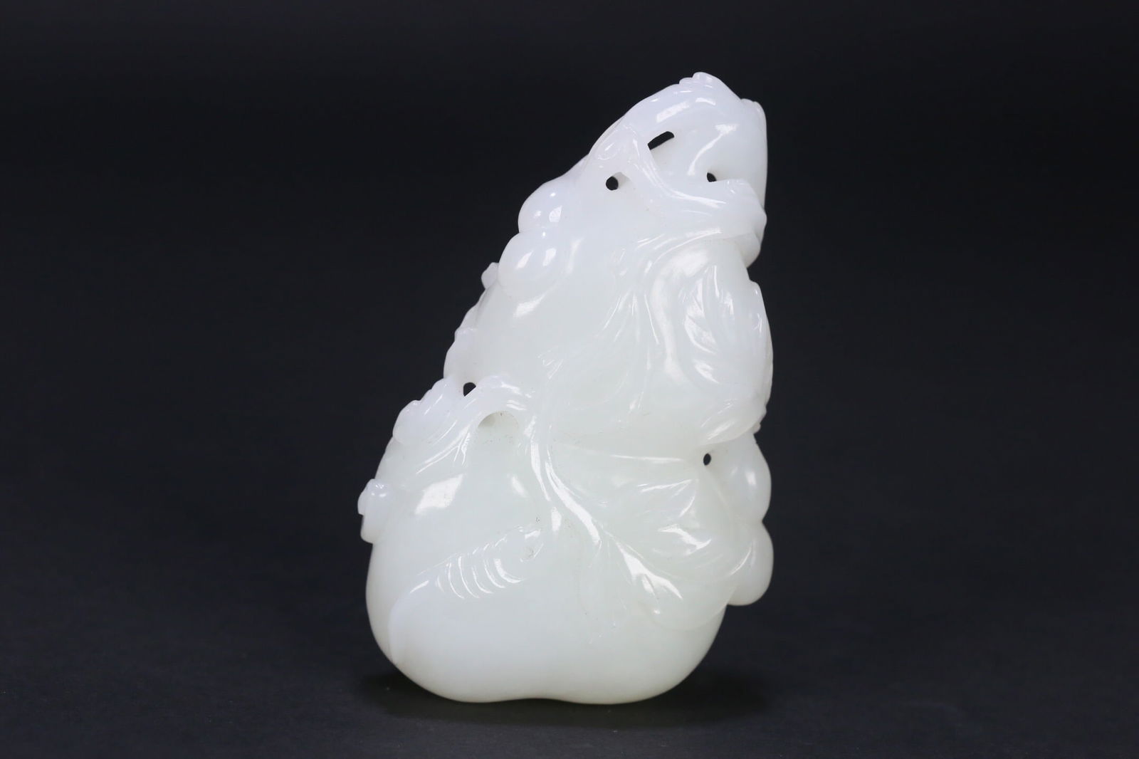 Hetian white jade hand-held piece: 7.6*4.9*2/104.6g