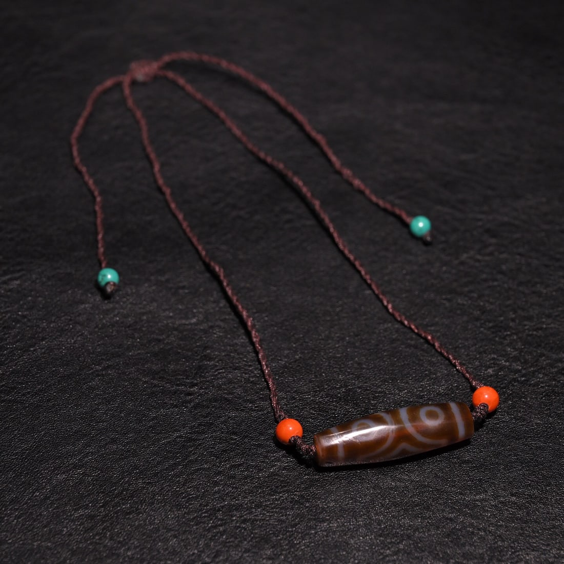 Tibetan agate three-eyed dzi bead necklace (1 of 1)