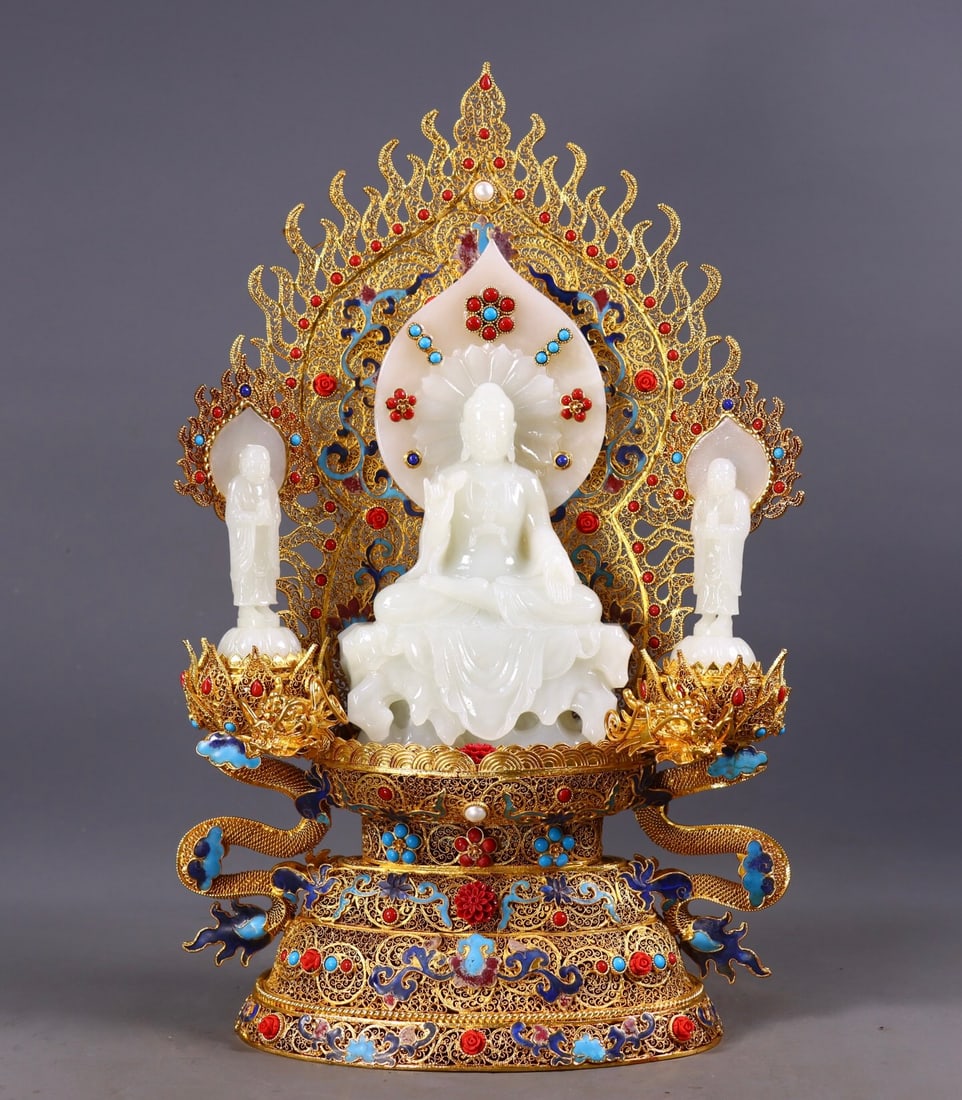A set of Qianlong-era filigree gilt-inlaid Hetian jade Buddha statues (1 of 3)