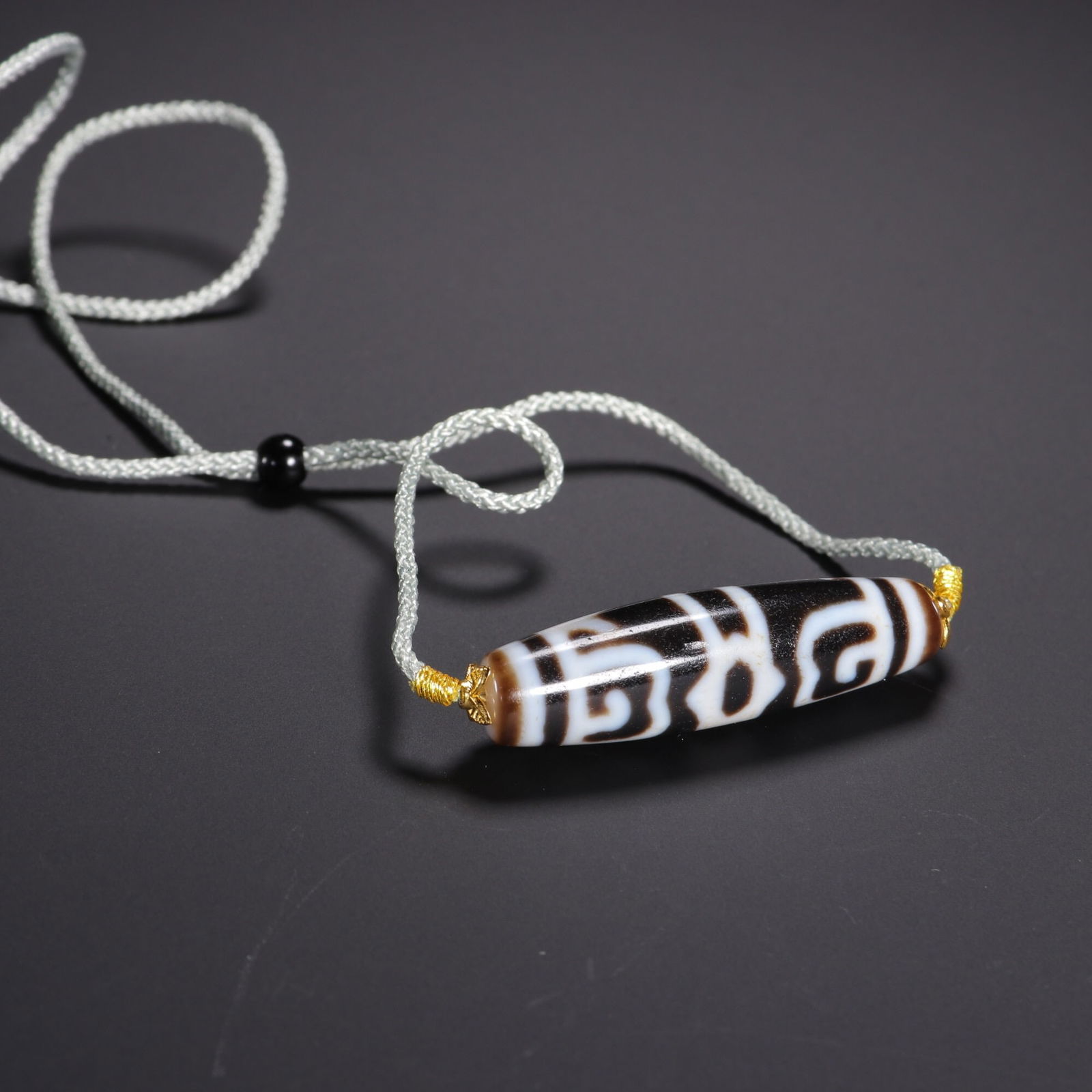 Tibetan double-hat dzi bead (1 of 1)