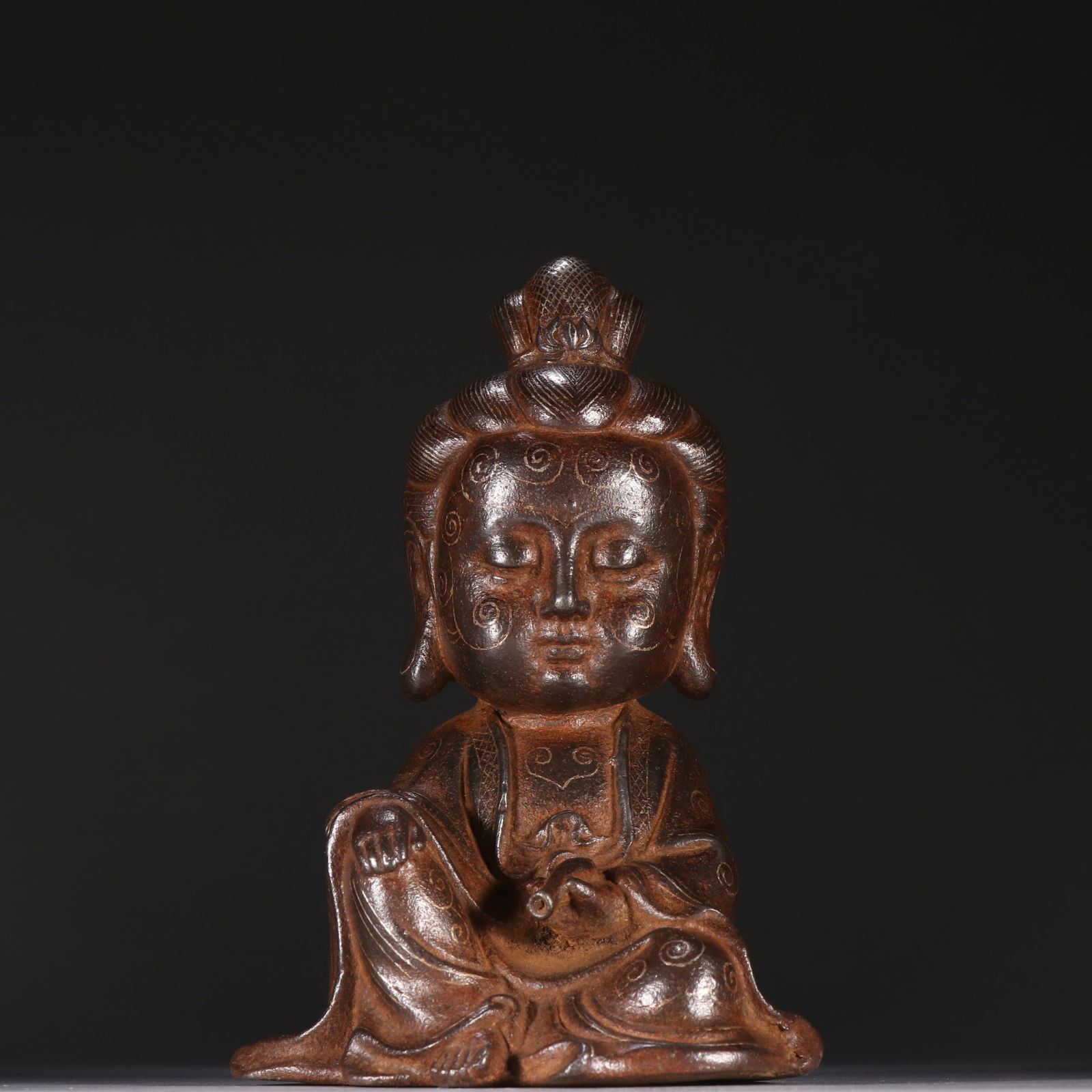 Copper and silver Buddha statues (1 of 3)