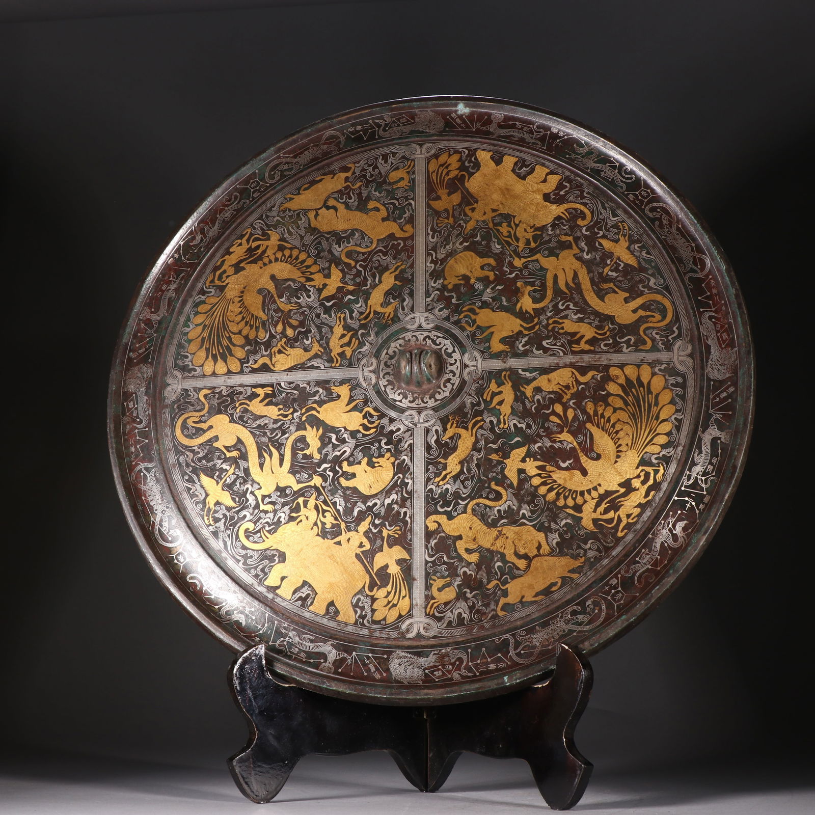 Han Dynasty bronze mirror made of gold, silver, and bronze (1 of 2)