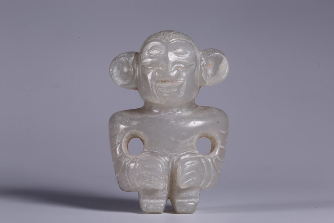 Jade hand-held piece: 4.7*3.2*1.8/38g