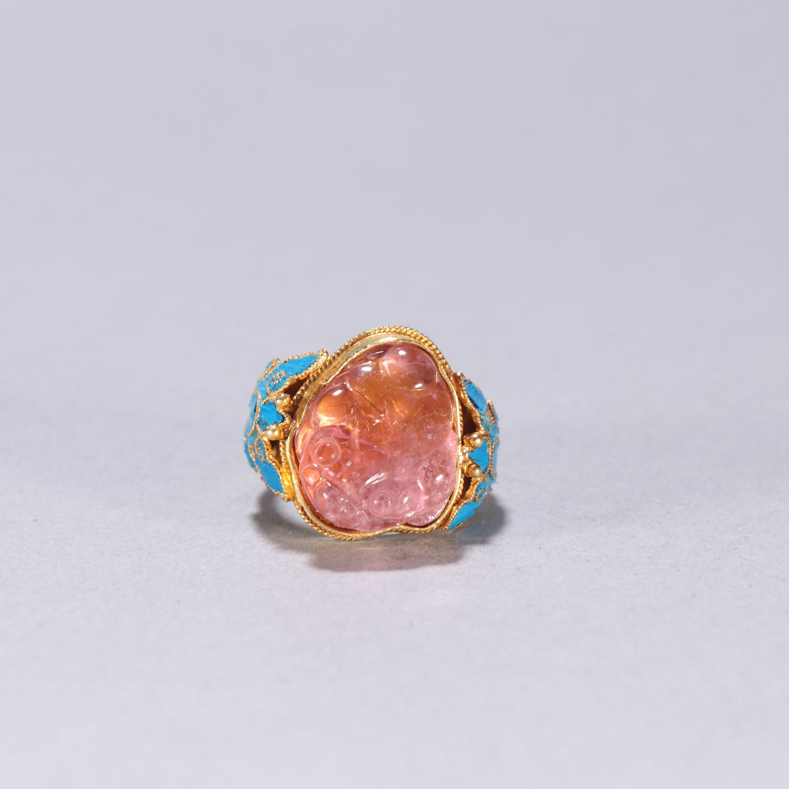 A Qing Dynasty silver-gilt ring inlaid with tourmaline (1 of 3)