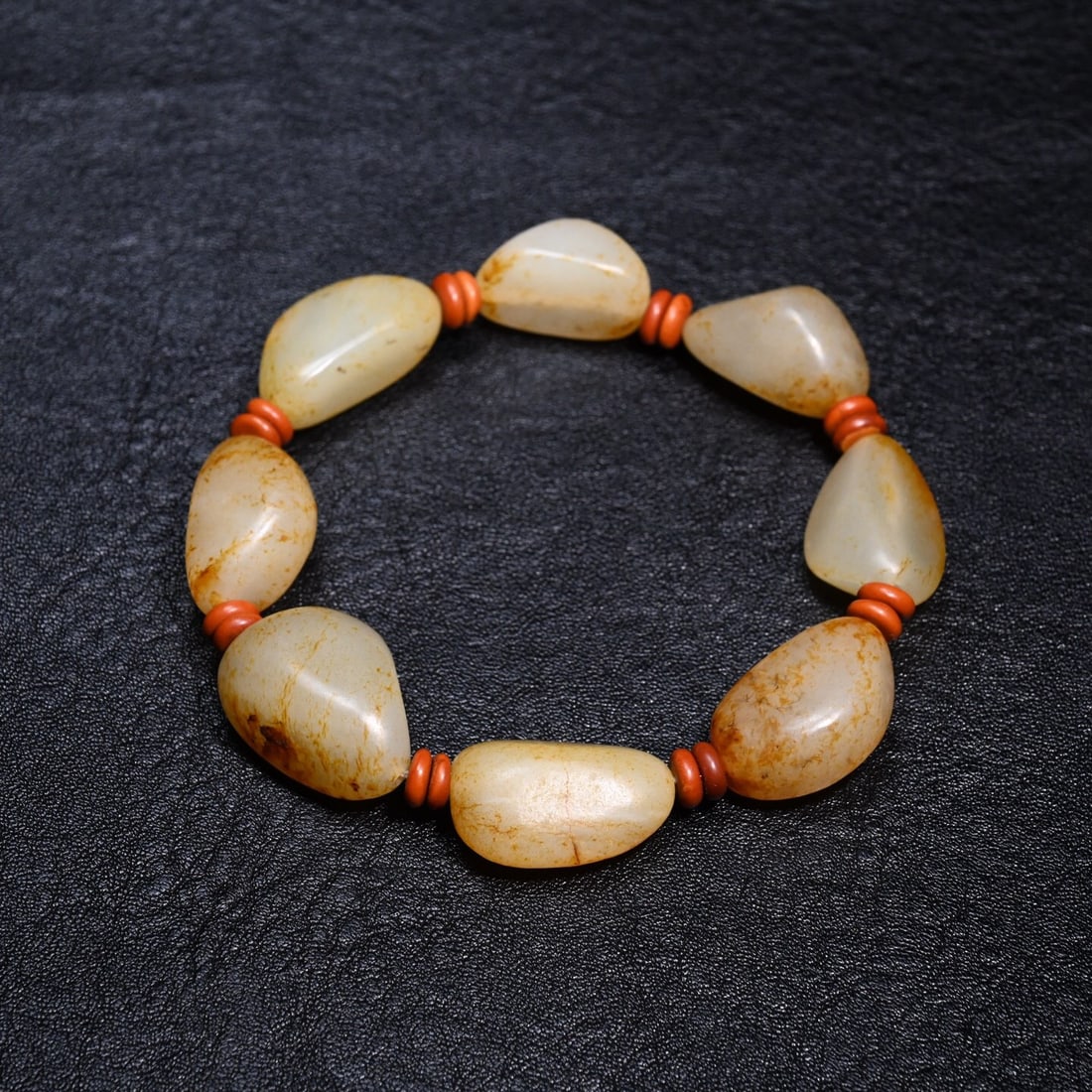 Red skin Hotan Jade seed raw stone hand string (1 of 1)