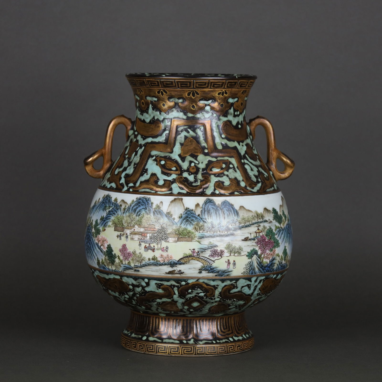 Qianlong-marked bronze-painted gold-painted and famille rose ruyi-handled vase: 25*20