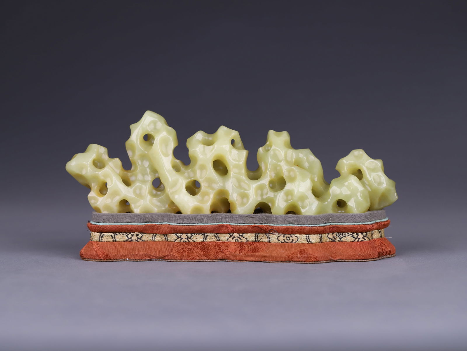 Qing Dynasty Hetian yellow jade mountain-shaped brush rest (1 of 2)