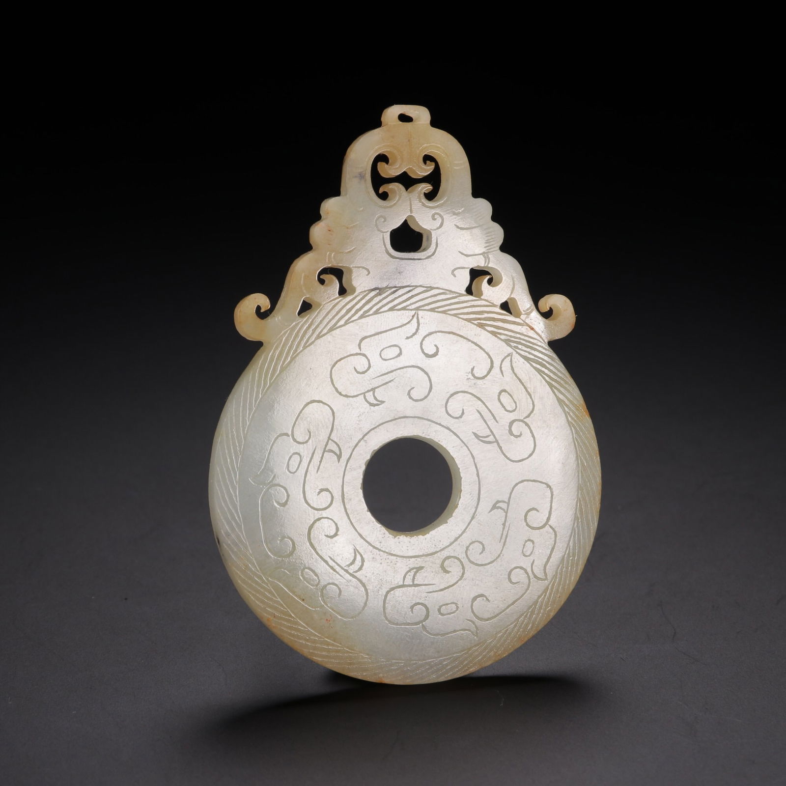 Jade pendant with protruding outline (1 of 2)