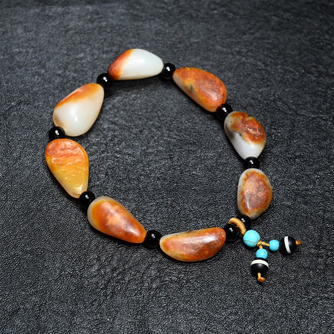 Hotan Jade original stone hand string: 2.5*1.4/39g