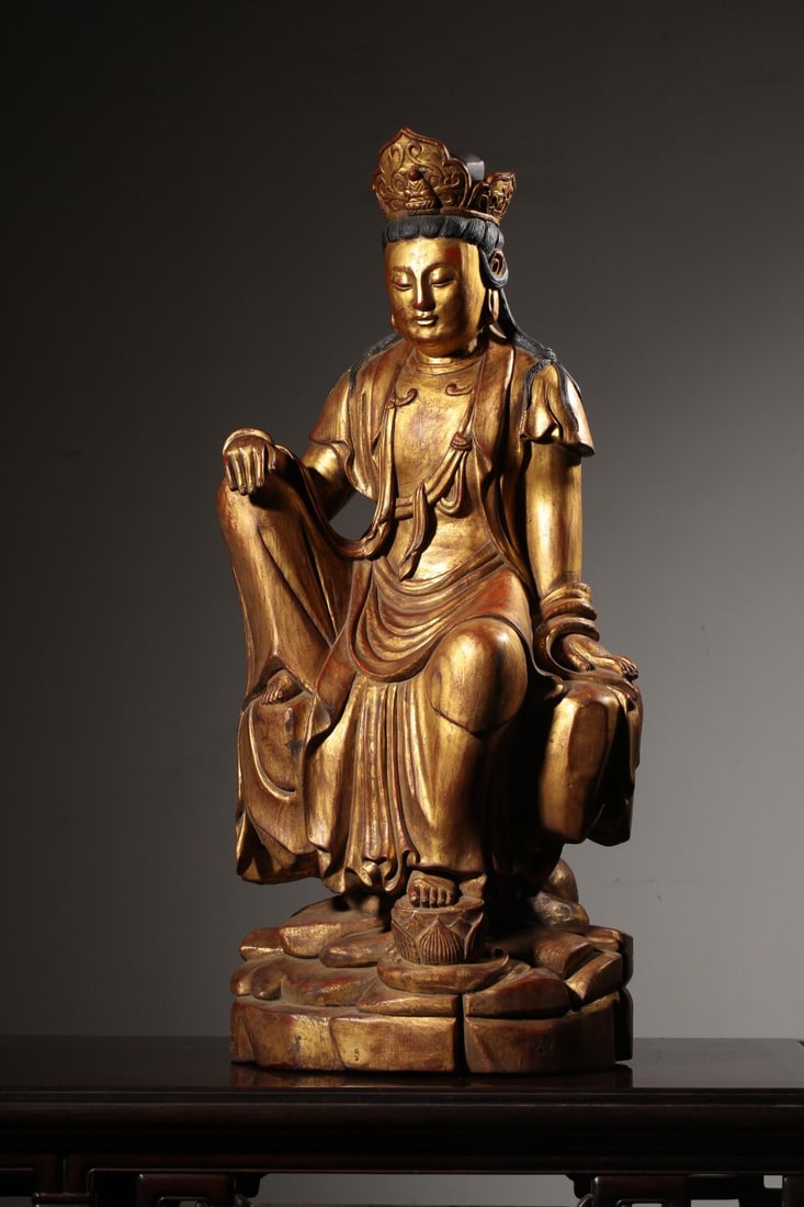 A Qing Dynasty Phoebe zhennan wood lacquered and gilded Buddhist statue (1 of 3)