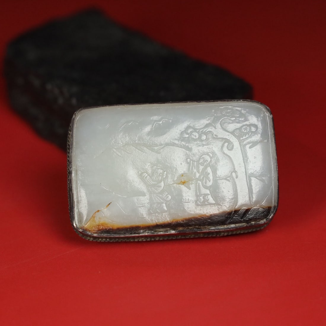 A Hetian jade belt buckle wrapped in silver: 7*4.5*1.8/105.5g