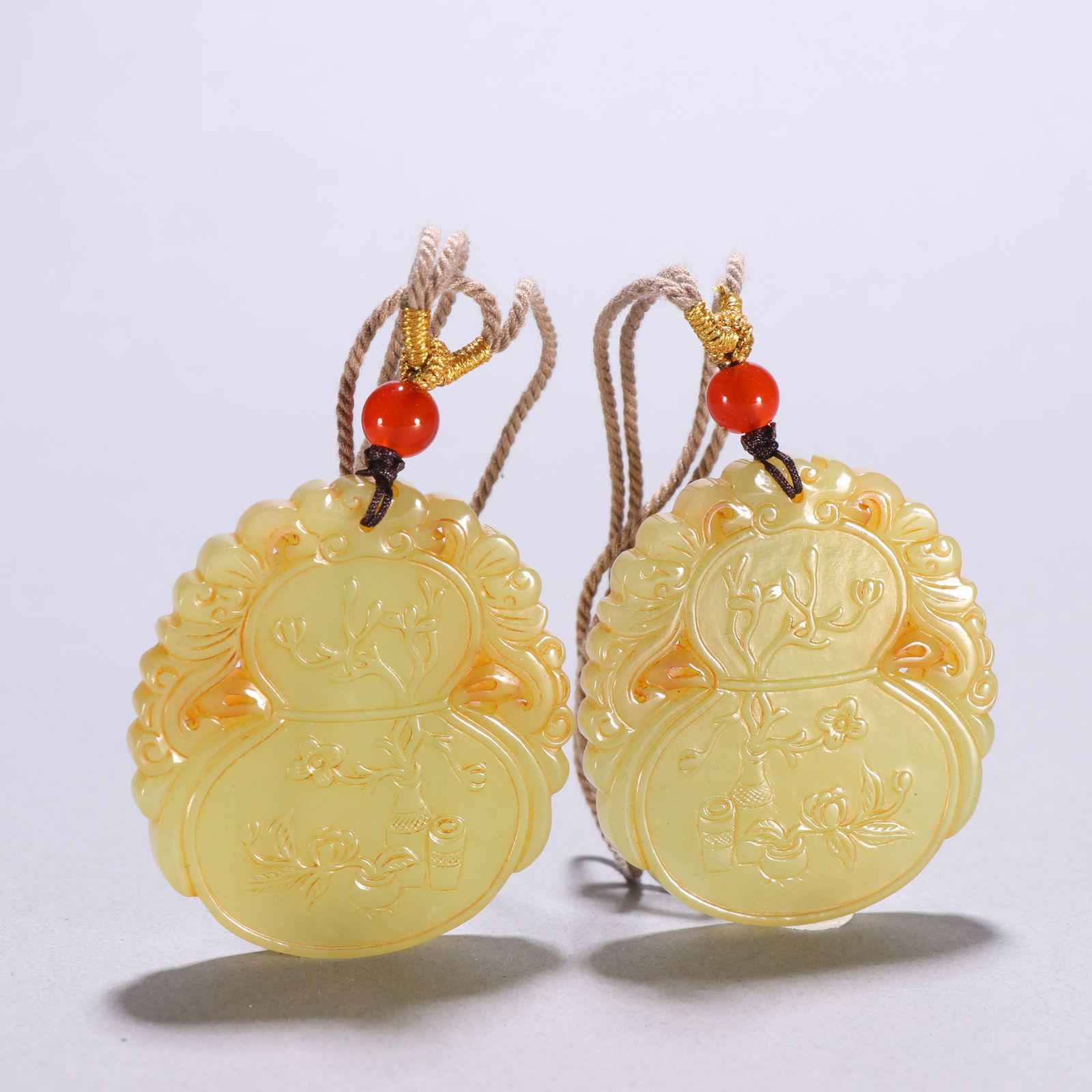 A Pair of Qing Dynasty Hetian Yellow Jade Pendants (1 of 2)