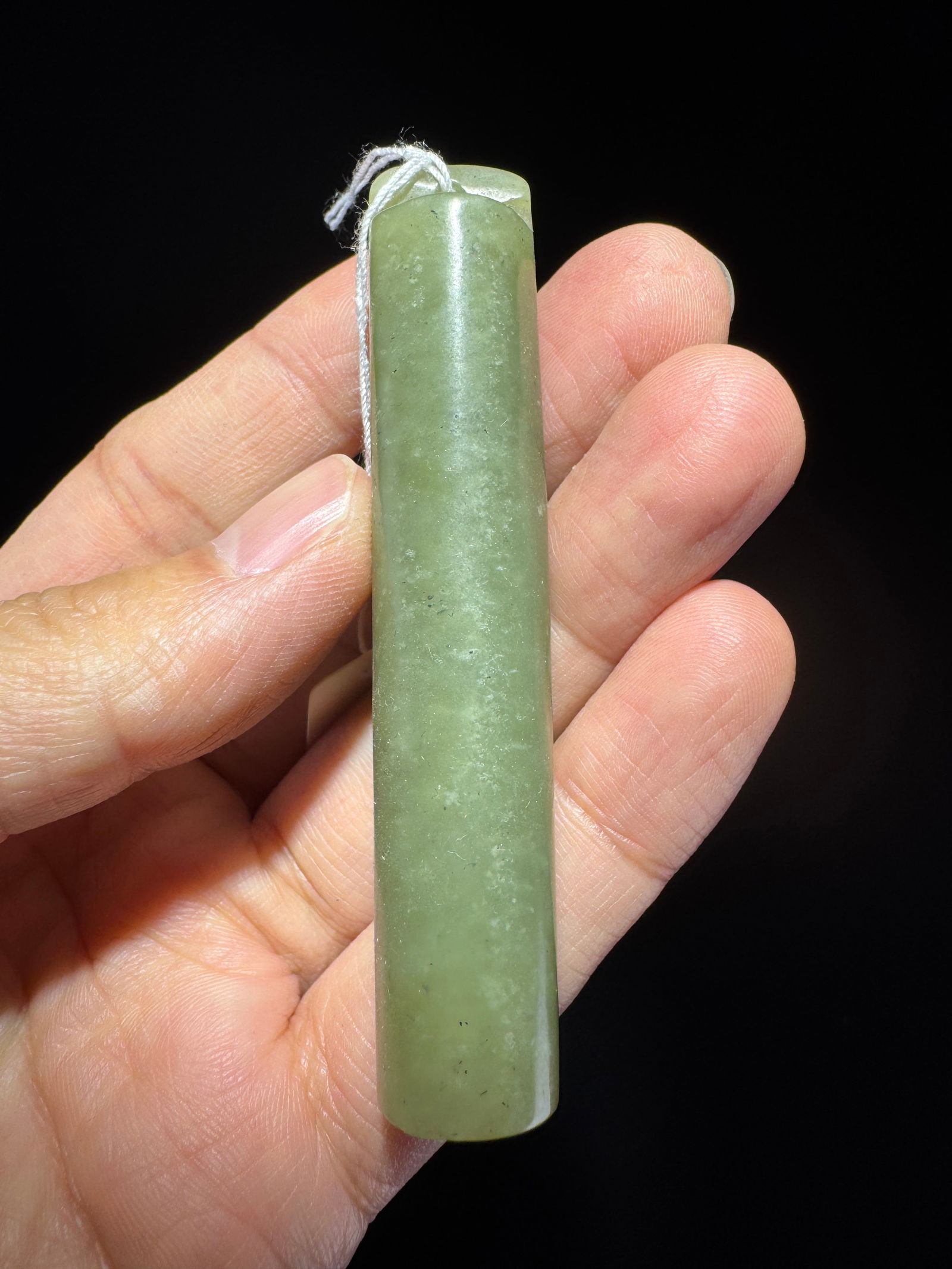 A Qing Dynasty Hetian jade feather tube (1 of 2)