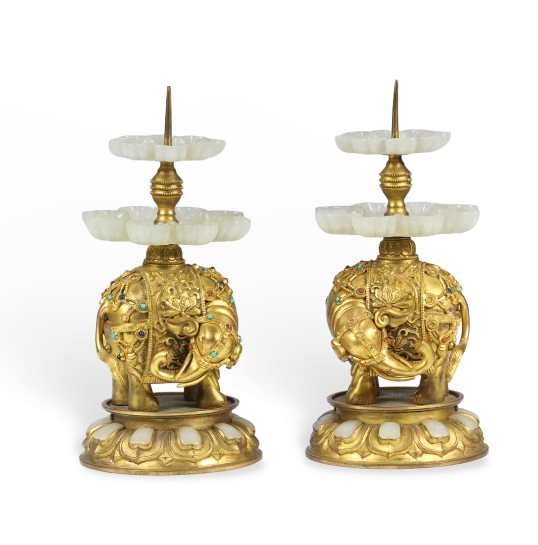 Chinese A pair of Qing Dynasty Qianlong mark gilt bronze candlesticks inlaid with jade, symbolizing: Height 20.8cm, base 10.1cm, jade 9.6cm, weight 1678g
