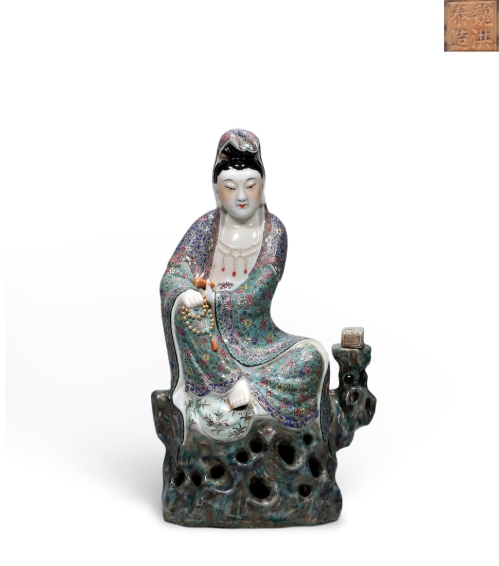 Chinese Wei Hongtai Mark A famille rose seated Guanyin statue bearing the inscription: Height 32.5 cm, length 19 cm, width 12.5 cm