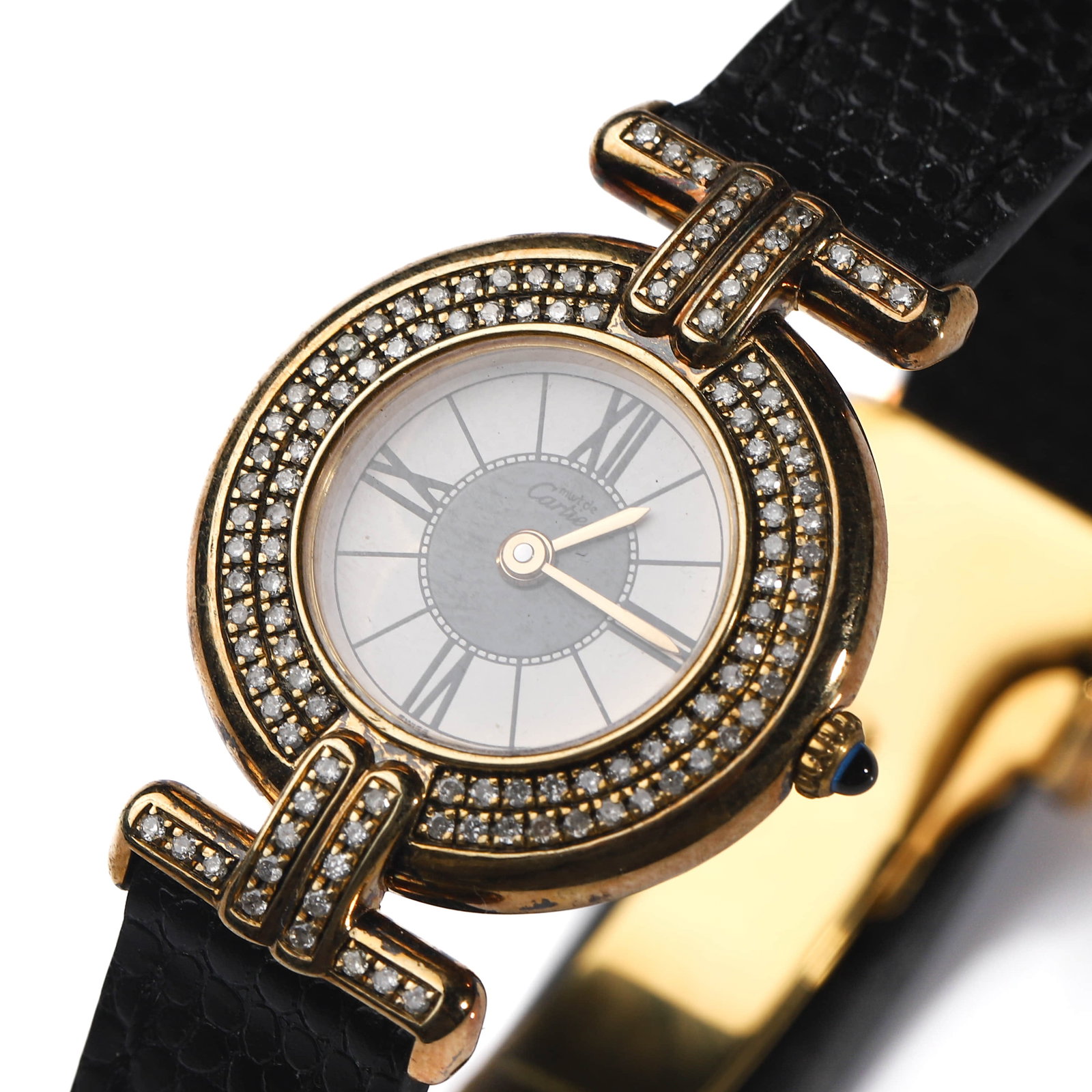 CARTIER PARIS VERMEIL DIAMOND-SET QUARTZ WRISTWATCH: Dimensions Case diameter: 1 1/64 in. (25.9 mm); overall length approx. 7 7/8 in. (20 cm). Description An elegant Cartier Paris ladies’ wristwatch, featuring a refined silvered dial with Roman numera