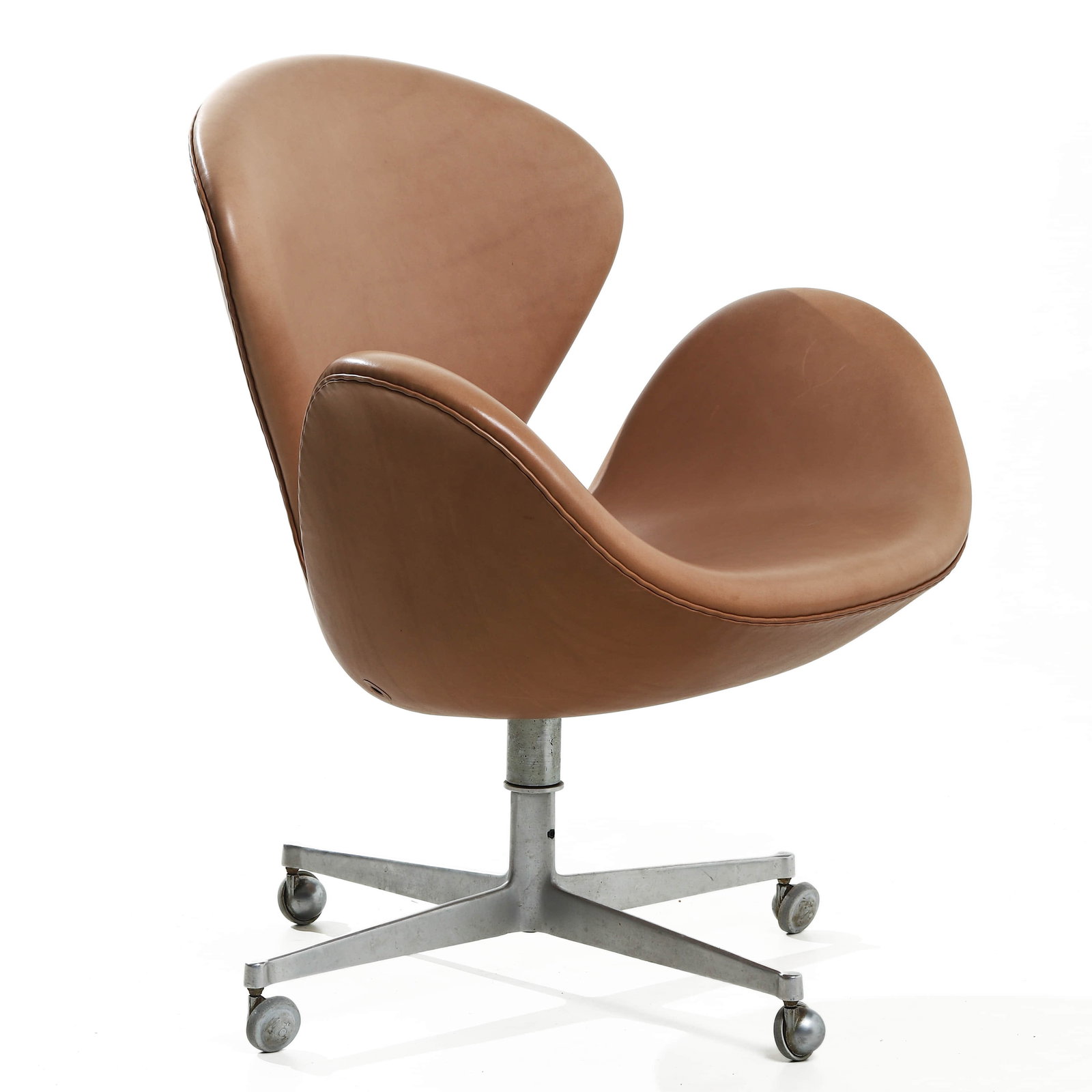 ARNE JACOBSEN "SWAN CHAIR" FOR FRITZ HANSEN: Dimensions Height 33 7/16 in. (85 cm), Seat height 16 15/16 in. (43 cm), Width 30 5/16 in. (77 cm) Description Designed in 1958 by Danish architect Arne Jacobsen for the SAS Royal Hotel in Copenhagen,