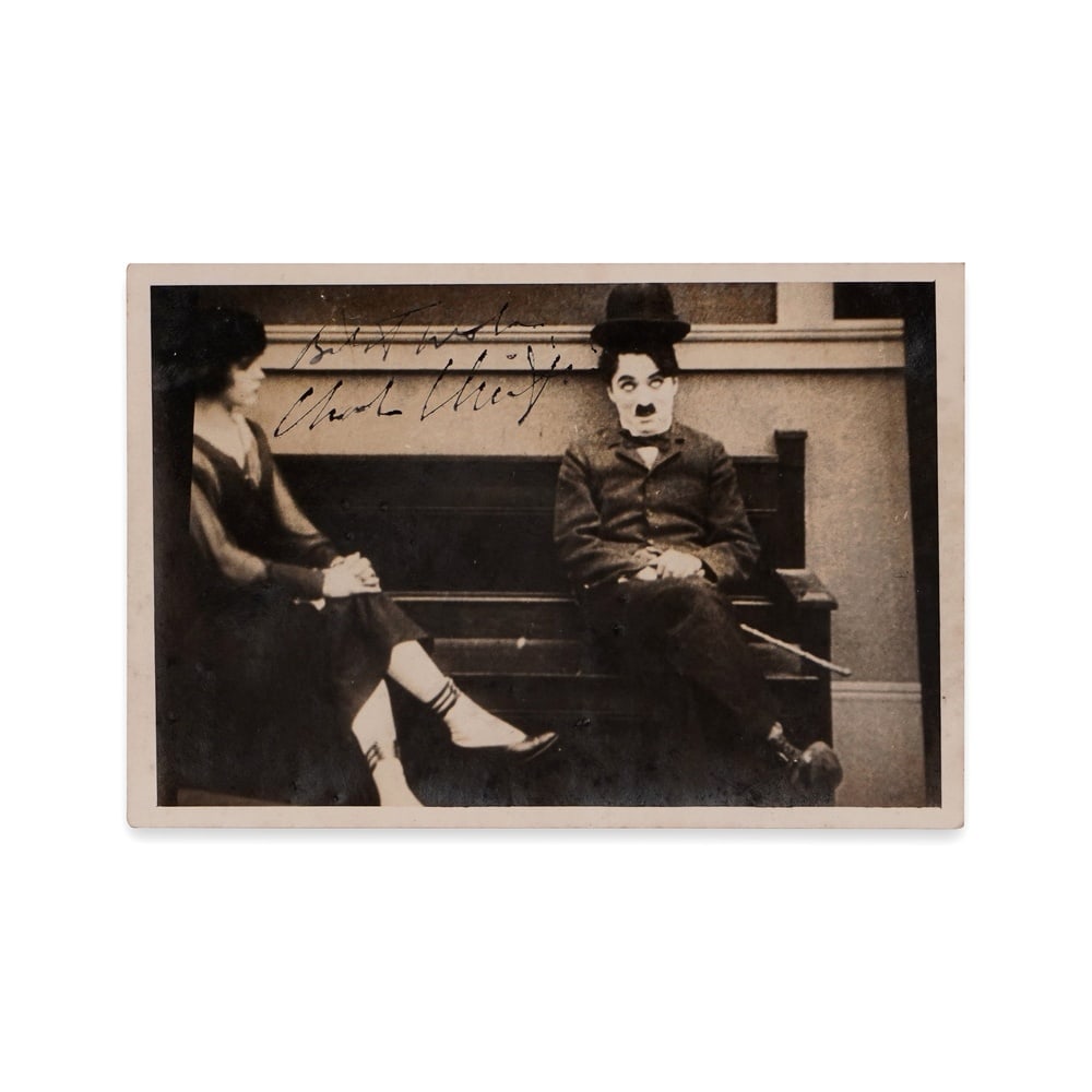 CHARLIE CHAPLIN SIGNED GELATIN SILVER PHOTOGRAPH: 4 3/4 x 3 1/8 in (12.1 x 8.1 cm) Provenance and Authentication: This collectible has undergone a rigorous forensic evaluation. The signatures were carefully analyzed across multiple criteria, includin