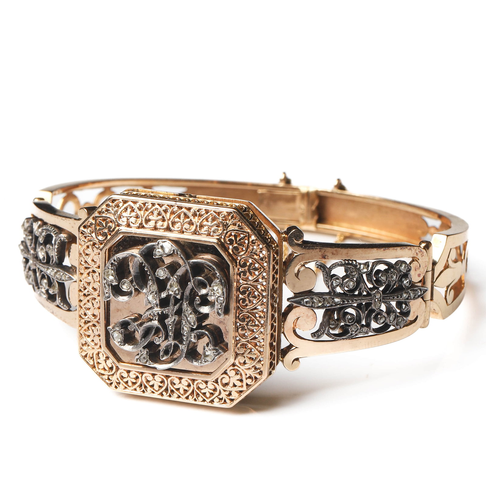 NAPOLEON III PERIOD (1852–1870), A FRENCH GOLD AND SILVER DIAMOND “HL?? OPENWORK BANGLE: Dimensions Inner Diameter: 2 – 2 1/4 in. (5.1 – 5.7 cm)Weight34.1 g Description A refined French aristocratic custom-made bangle from the Napoleon III period, exquisitely handcrafted in 18K gold. 