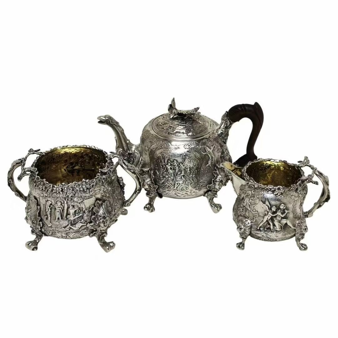 19th-century silver high-relief figure and scene tea set (three pieces) (1 of 7)