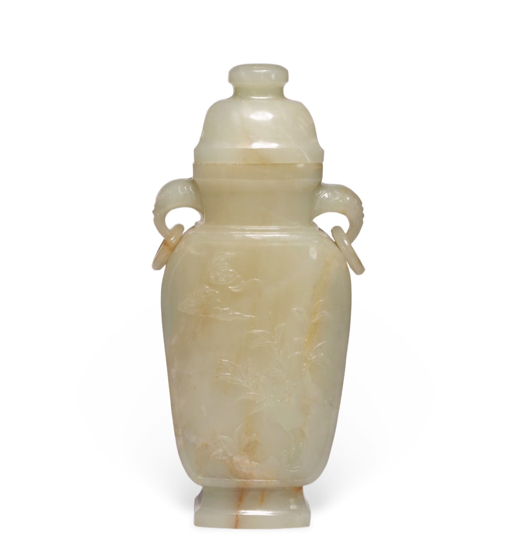 Chinese Hetian white jade vase with floral and bird design and double elephant handles: It measures 19 cm in height, 8.5 cm in length, and 4.7 cm in width.