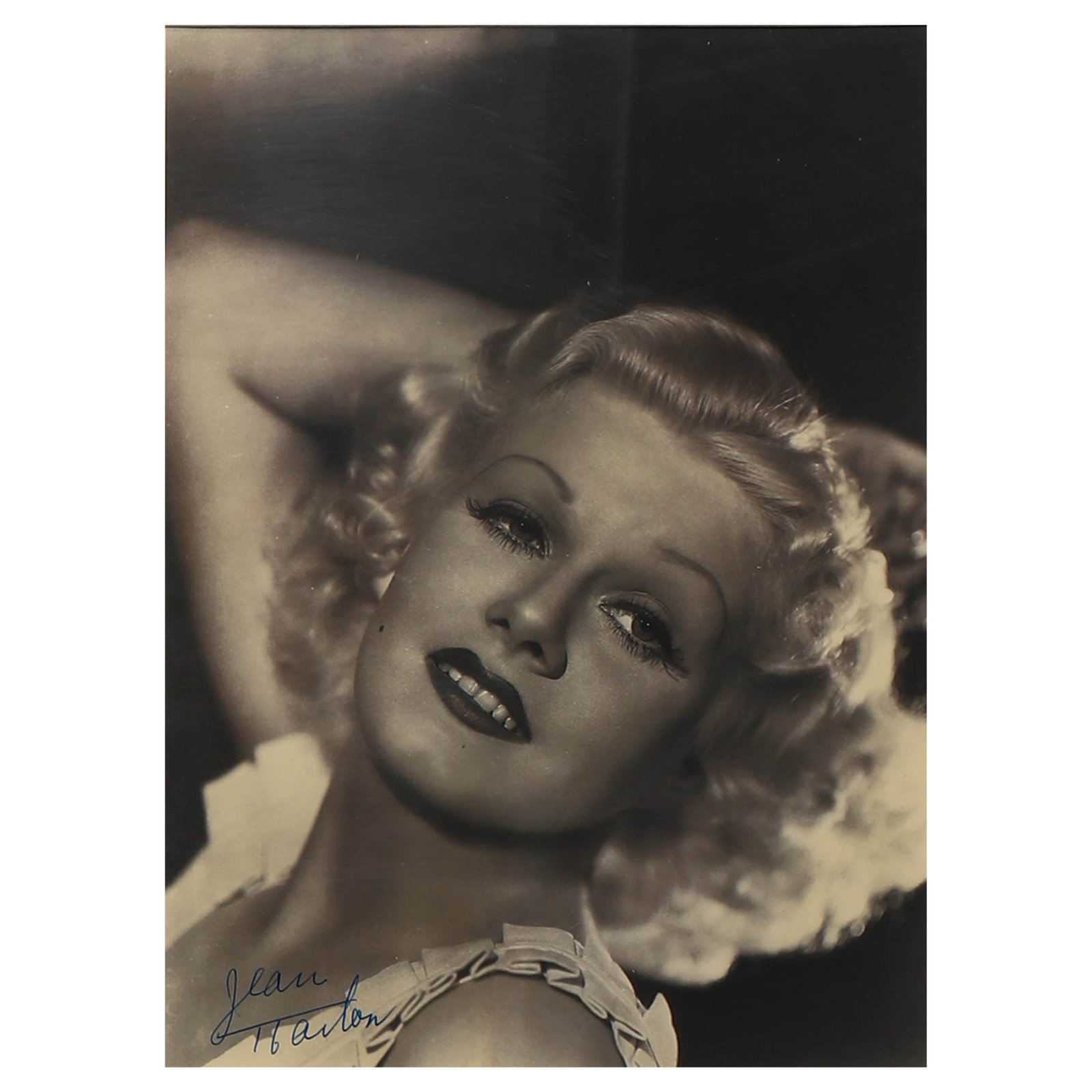 JEAN HARLOW SIGNED PORTRAIT: Title: Jean Harlow Signed Portrait Medium Gelatin silver print, mounted on board Signature Signed in blue ink "Jean Harlow" along the left side of the photograph Dimensions Photograph 7 3/8 × 9