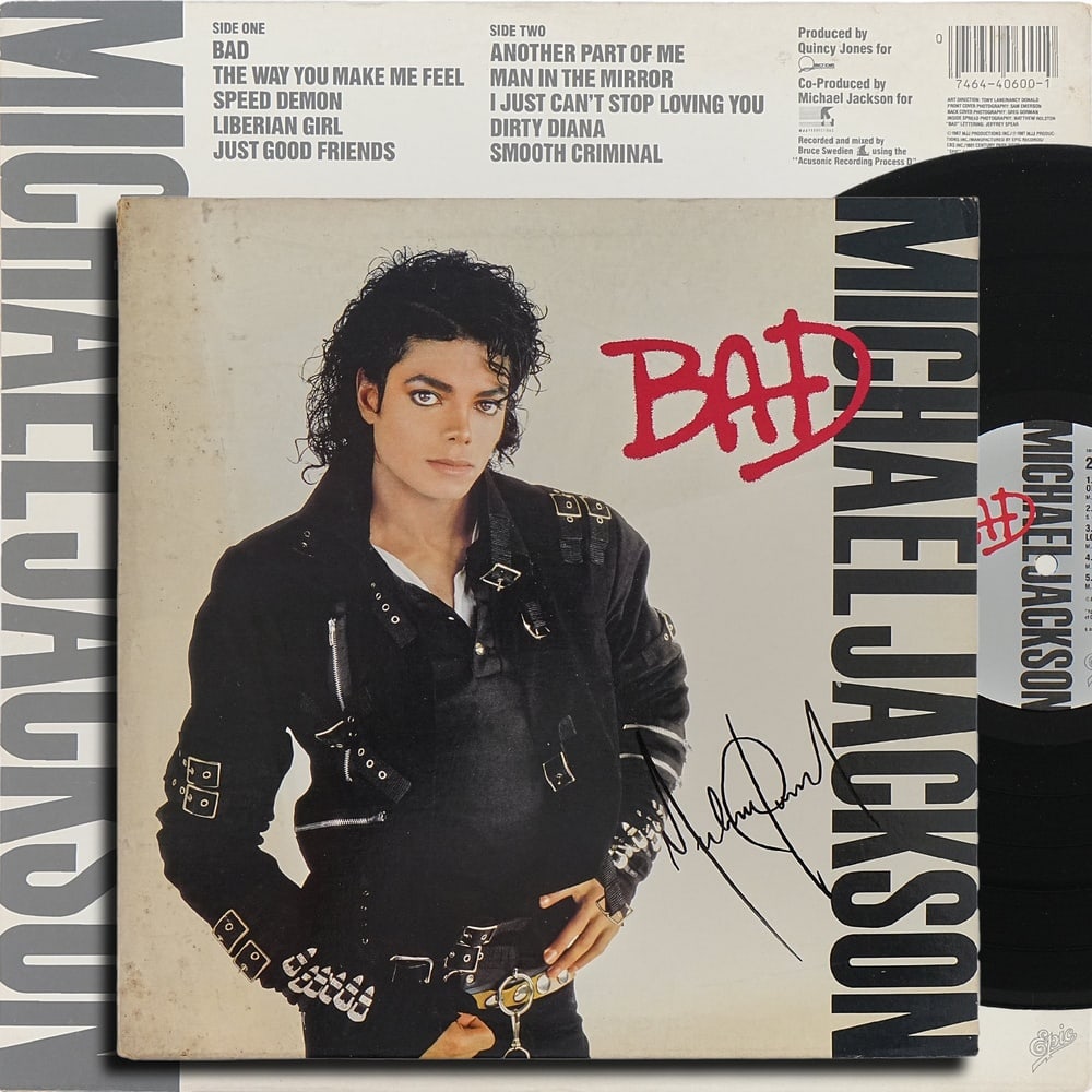 MICHAEL JACKSON SIGNED "BAD" U.S. FIRST PRESSING LP: 12 1/4 x 12 1/4 in Provenance and Authentication: This collectible has undergone a rigorous forensic evaluation. The signatures were carefully analyzed across multiple criteria, including ink depositi