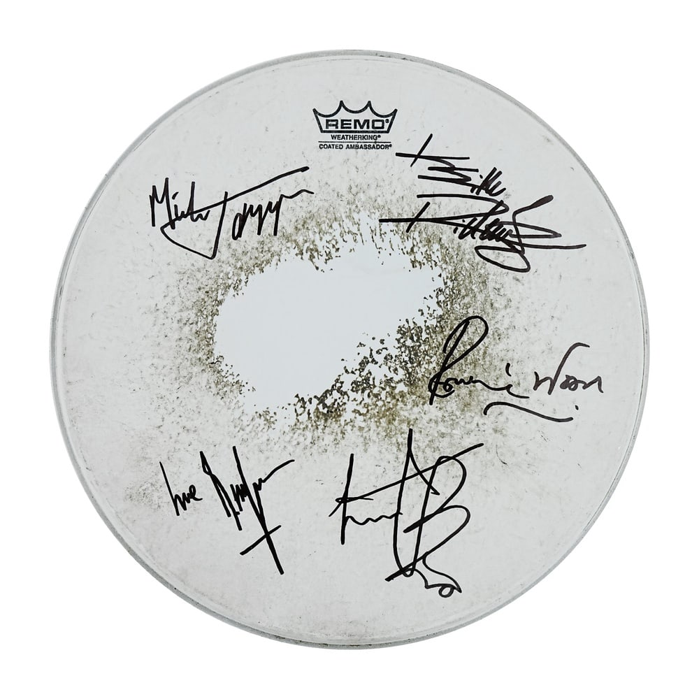 SEATTLE GRUNGE BAND SIGNED DRUMHEAD WITH KURT COBAIN AUTOGRAPH: Diameter 14 in (35.5 cm) This signed Remo drumhead represents a fascinating artifact from the Seattle grunge movement, featuring signatures from members of a local grunge band together with a