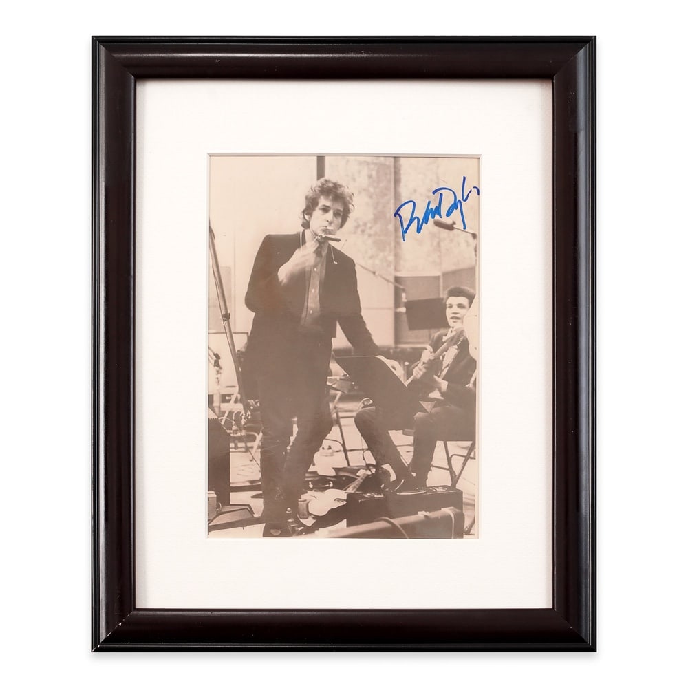 BOB DYLAN SIGNED GELATIN SILVER PHOTOGRAPH: Image Dimensions: 9 7/8 x 6 7/8 in (25 x 17.6 cm) Provenance and Authentication: This collectible has undergone a rigorous forensic evaluation. The signatures were carefully analyzed across multiple