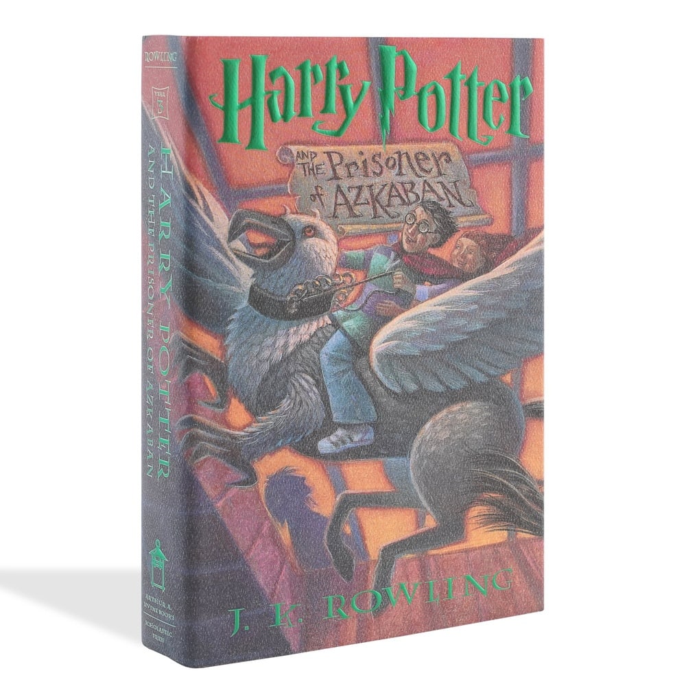 J.K. ROWLING SIGNED "HARRY POTTER AND THE PRISONER OF AZKABAN" FIRST AMERICAN EDITION: 9 1/4 x 6 1/4 in (23.5 x 15.8 cm) J.K. Rowling is one of the most commercially successful and culturally influential authors of modern literature. The Harry Potter series has become a global phenomeno