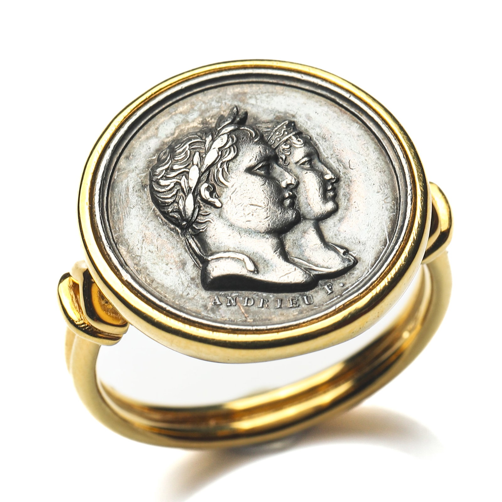 NAPOLEON I AND EMPRESS JOSÉPHINE ANTIQUE COIN GOLD RING: Dimensions Ring Size HK 14 Weight 6.5 g Description An elegant gold ring set with an antique commemorative silver coin depicting Napoleon I and Empress Joséphine in conjoined bust portraits.
