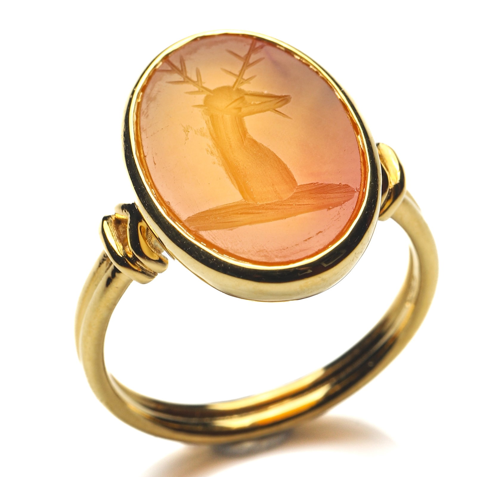 ANCIENT ROMAN DEER AGATE INTAGLIO GOLD RING: Dimensions Ring Size HK 13; Face 11/16 × 1/2 in. (1.8 × 1.3 cm) Weight 5.15 g Description An Ancient Roman gold ring featuring a finely carved agate intaglio depicting a deer. In classical art and m