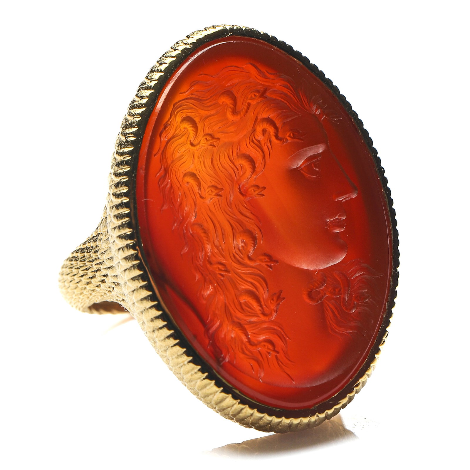 VICTORIAN MEDUSA AGATE INTAGLIO GOLD RING: Dimensions Ring Size HK 19 Face 1 3/16 × 13/16 in. (3.0 × 2.1 cm) Weight 16.8 g Description A striking Victorian 18K gold ring set with a finely hand-carved agate intaglio depicting the profile bust