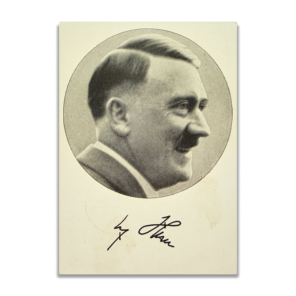 ADOLF HITLER SIGNED PORTRAIT POSTCARD: 5 7/8 x 4 1/8 in (14.8 x 10.5 cm) Adolf Hitler remains one of the most historically significant and controversial figures of the twentieth century, whose role in shaping World War II and global geopol