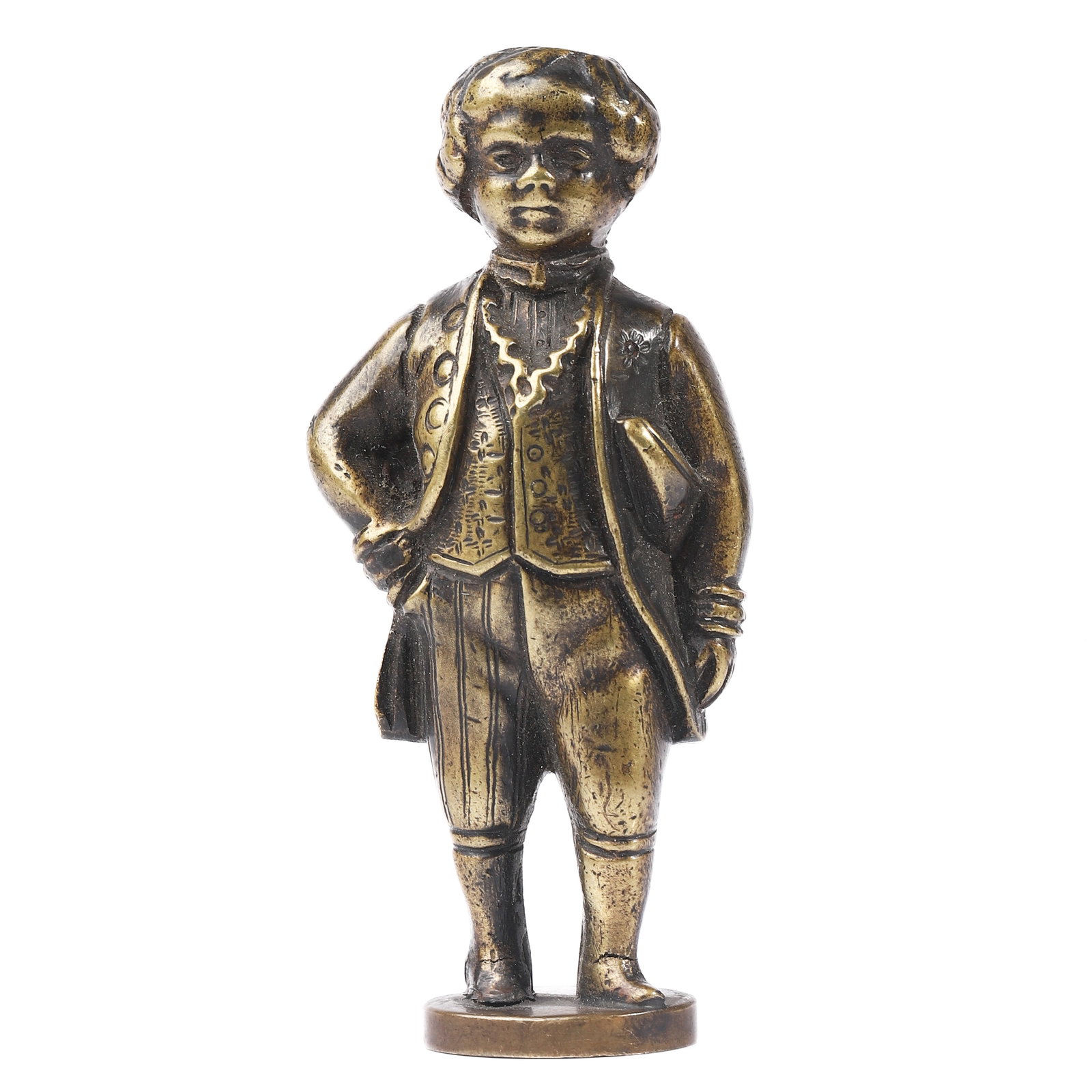 A GILT BRONZE FIGURE SEAL OF A YOUNG GENTLEMAN: Dimensions Height 3 1/4 in (8.2 cm); Weight 198.4 g. Description A substantial gilt bronze seal modeled as a young gentleman in 18th-century attire, depicted with a waistcoat, long coat, breeches, and